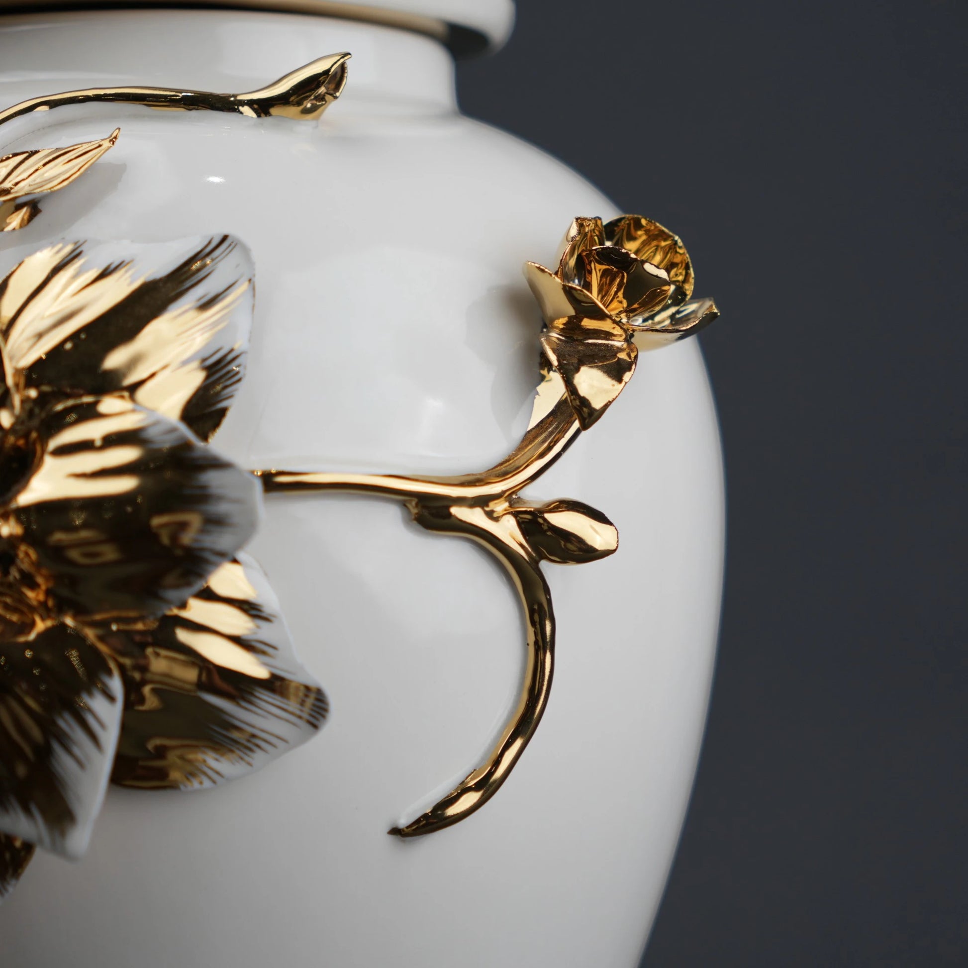 White ceramic jar with gold floral stem design, lid and vase use for home decor styling