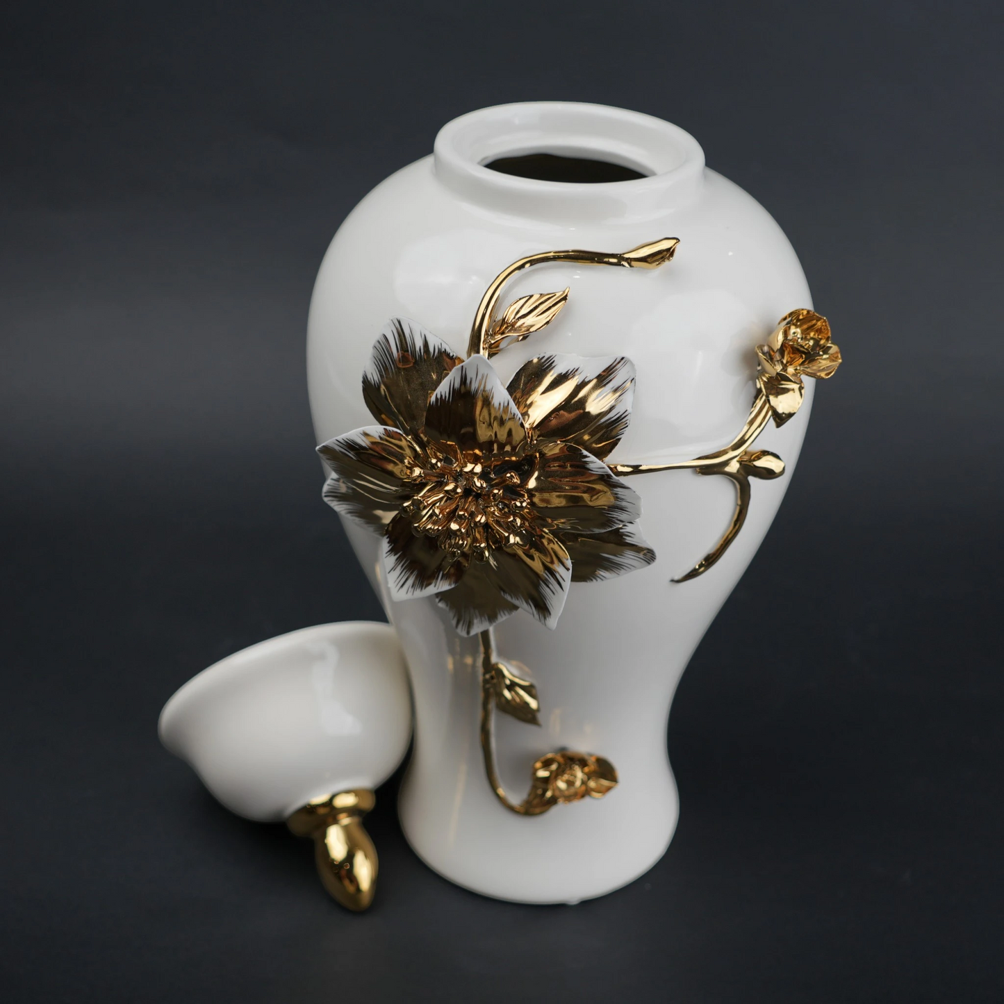 White ceramic jar with gold floral stem design, lid and vase use for home decor styling