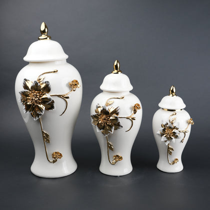 White ceramic jar with gold floral stem design, lid and vase use for home decor styling