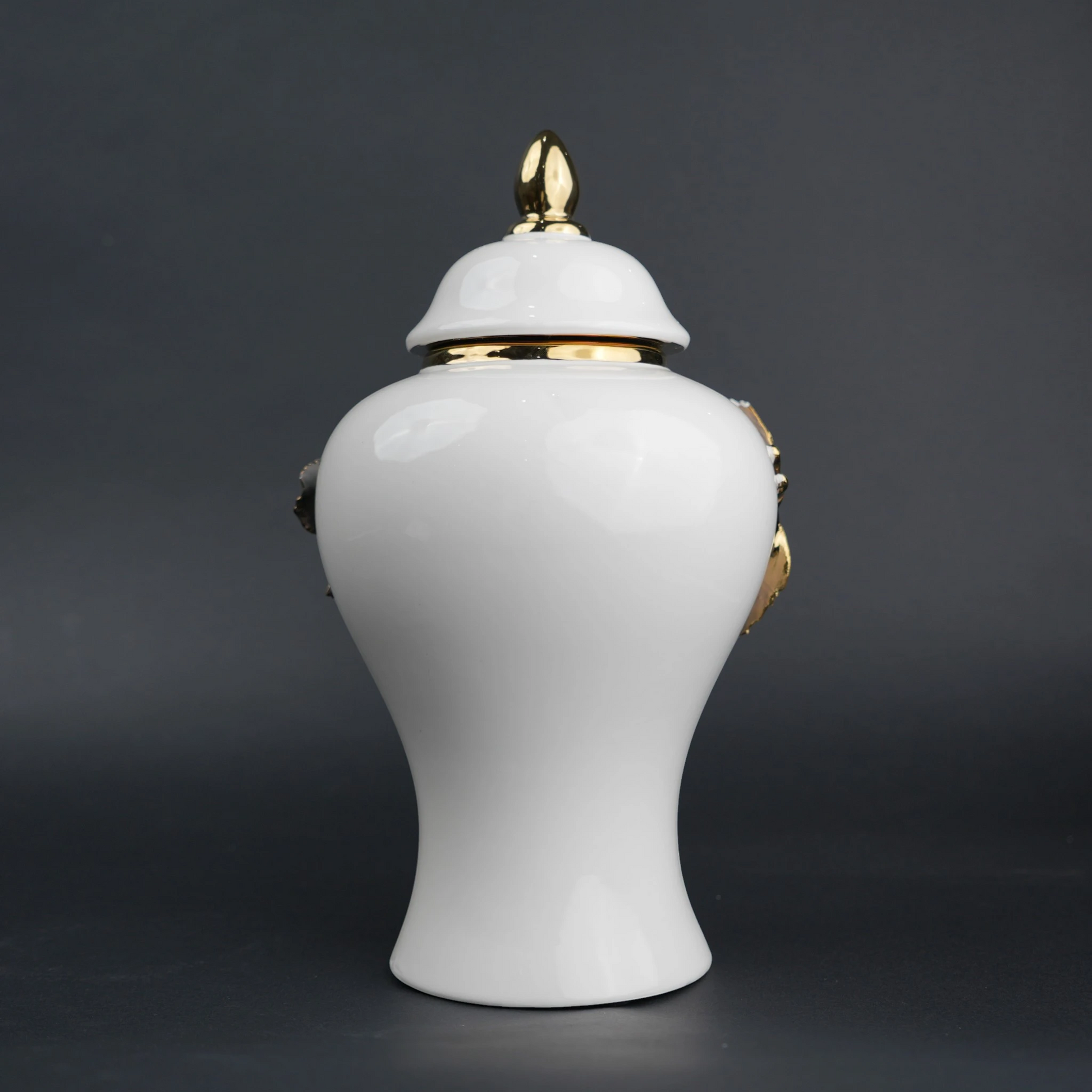 White ceramic decorative jar with gold laurel leaf band and lid