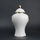 White ceramic decorative jar with gold laurel leaf band and lid