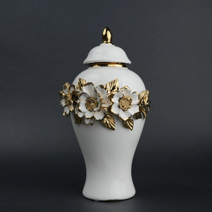 White ceramic jar with gold floral detailing and lid for luxury home decor styling