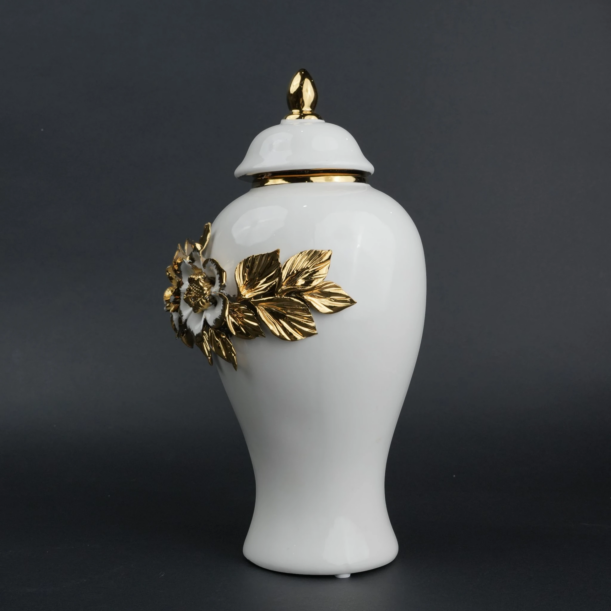 White ceramic jar with gold floral detailing and lid for luxury home decor styling