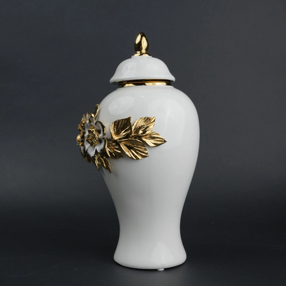White ceramic jar with gold floral detailing and lid for luxury home decor styling