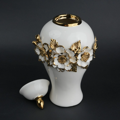 White ceramic jar with gold floral detailing and lid for luxury home decor styling