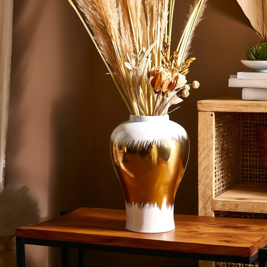 Gilded brush jar w/ pampas on wood console