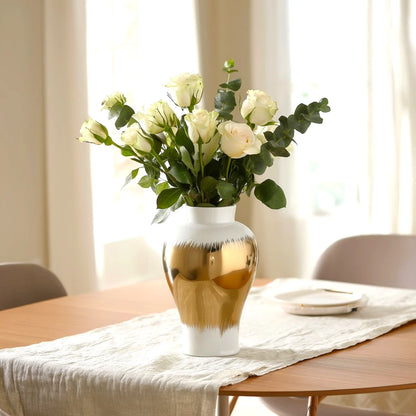 Gilded brush jar w/ roses, sunlit dining