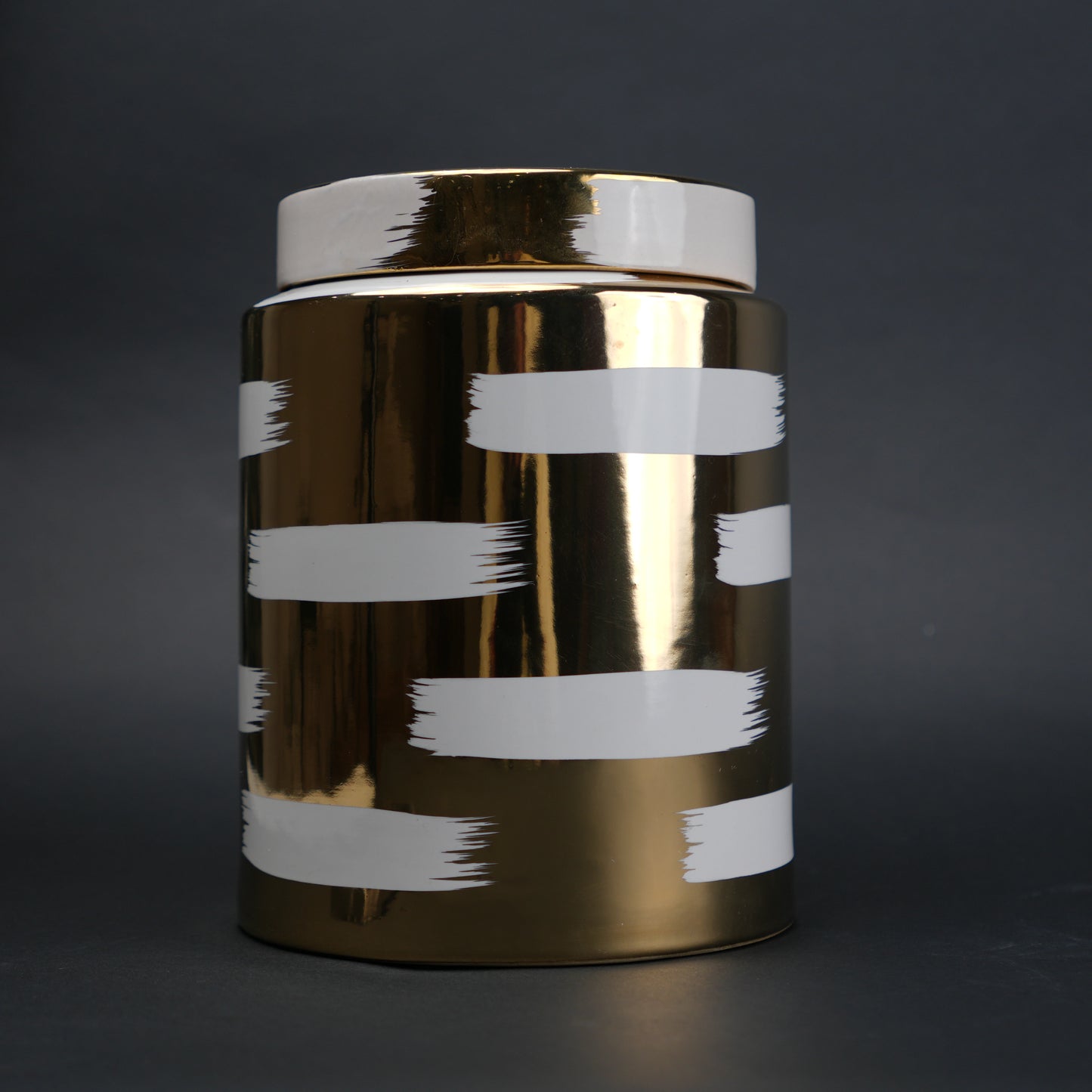 Golden stroke jar front studio on grey