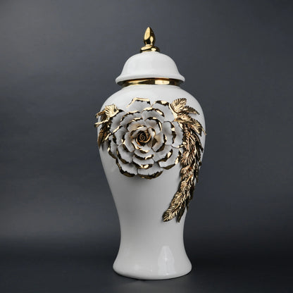 White ceramic jar with gold leaf design and lid