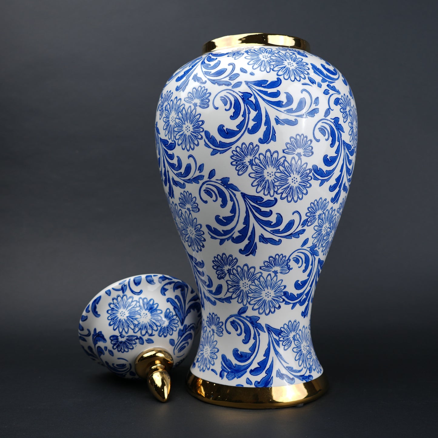 Blue and white ceramic jar with floral design and lid for home decor styling