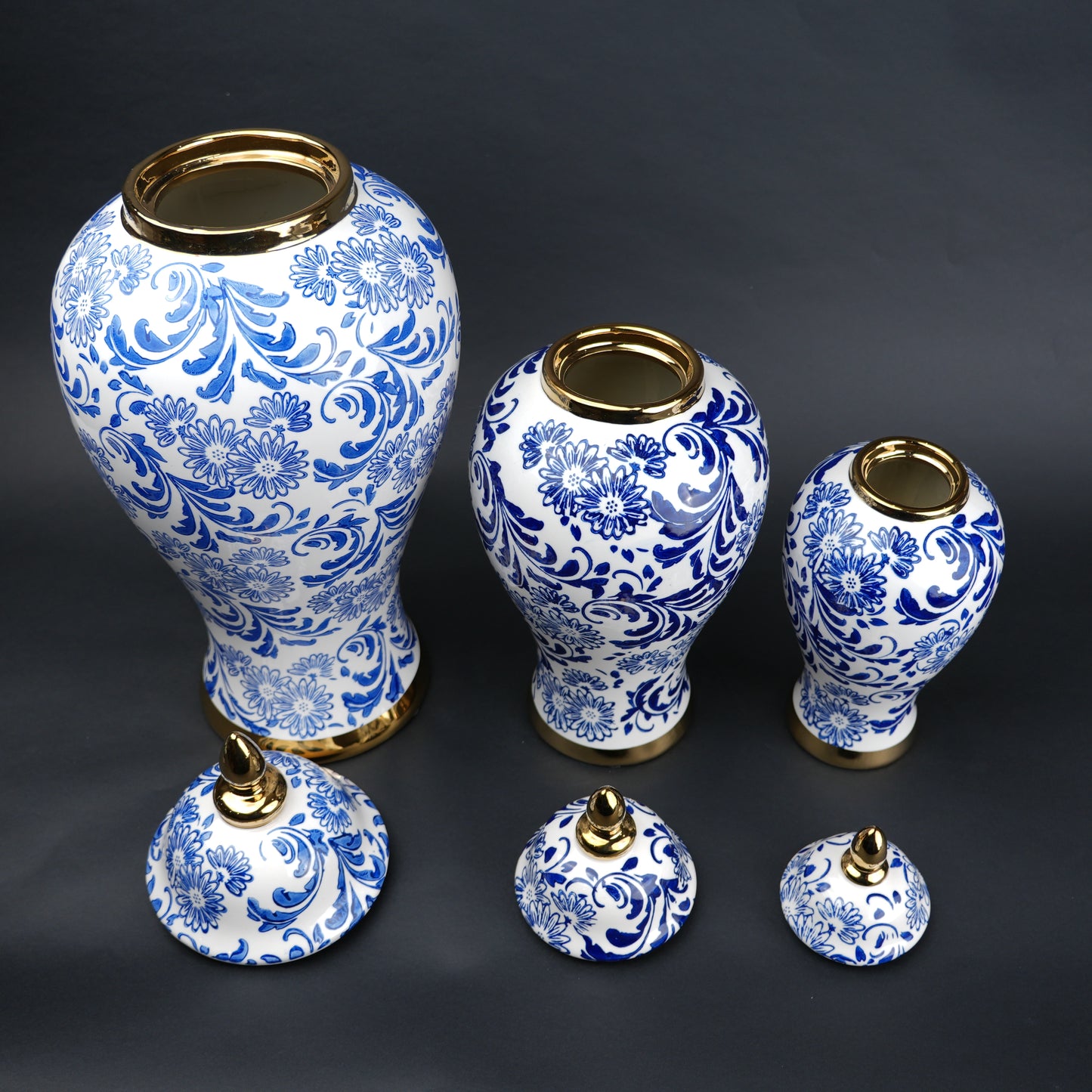Blue and white ceramic jar with floral design and lid for home decor styling
