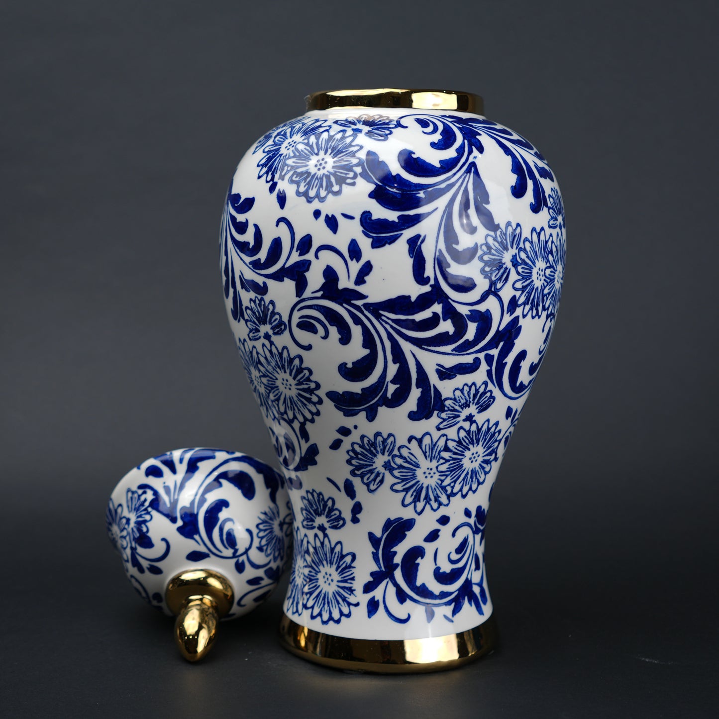 Blue and white ceramic jar with floral design and lid for home decor styling