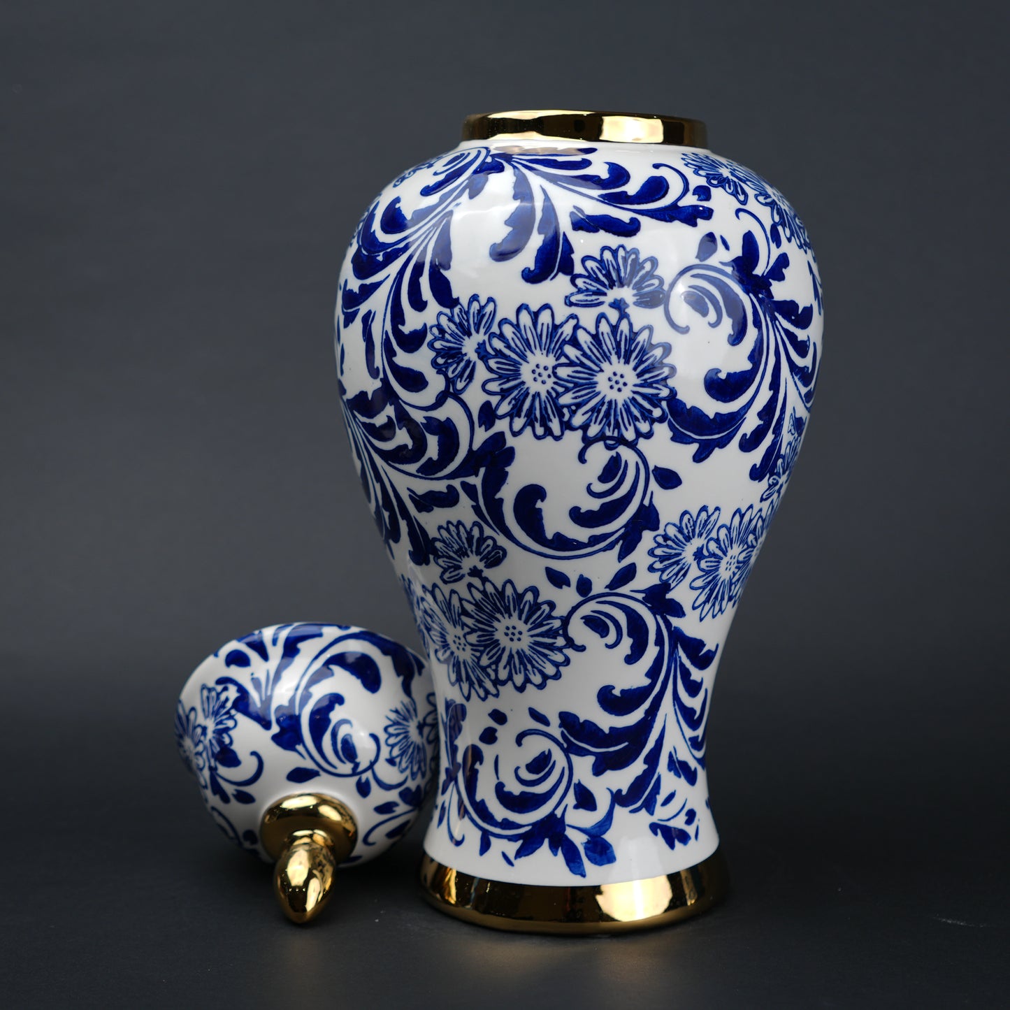 Blue and white ceramic jar with floral design and lid for home decor styling