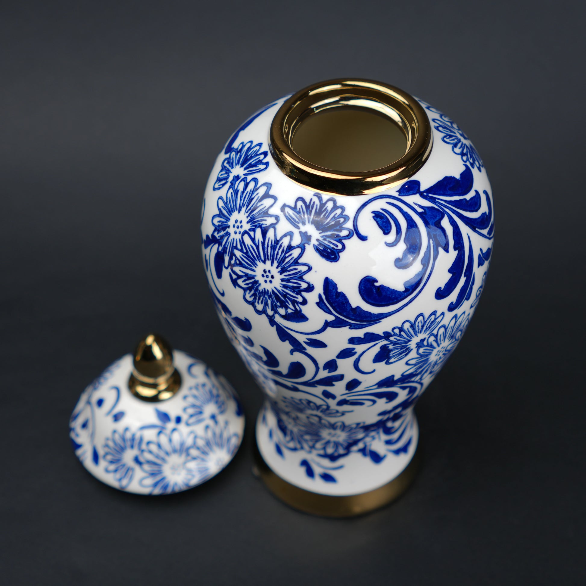 Blue and white ceramic jar with floral design and lid for home decor styling