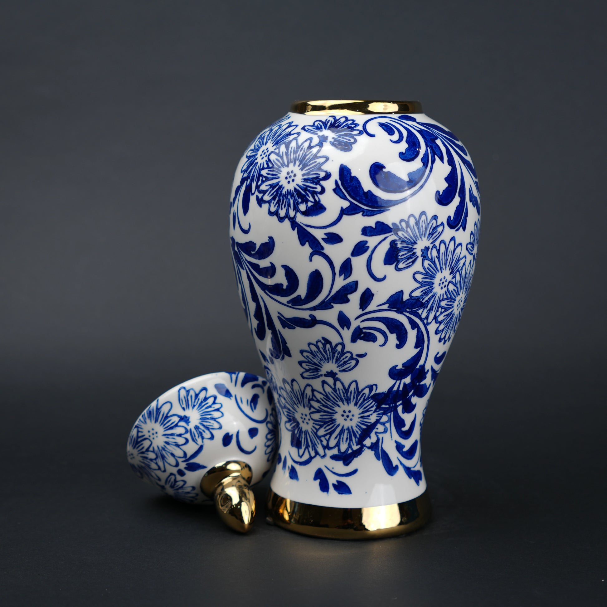 Blue and white ceramic jar with floral design and lid for home decor styling