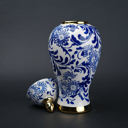 Blue and white ceramic jar with floral design and lid for home decor styling