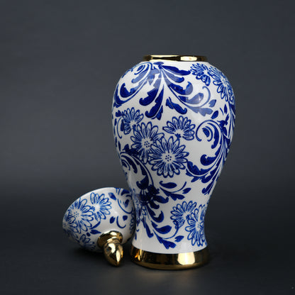 Blue and white ceramic jar with floral design and lid for home decor styling