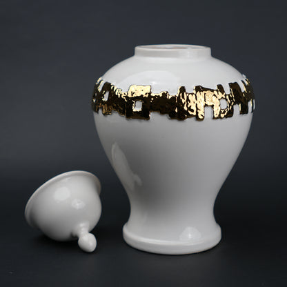 White ceramic jar with gold band detailing and lid for modern home decor styling
