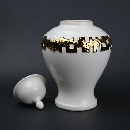 White ceramic jar with gold band detailing and lid for modern home decor styling