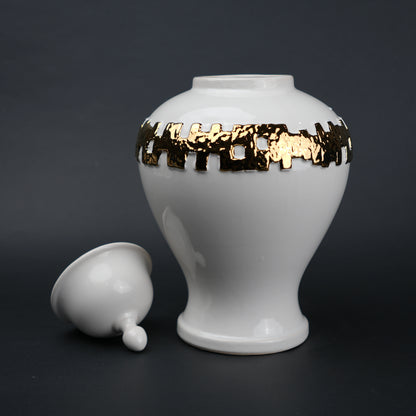 White ceramic jar with gold band detailing and lid for modern home decor styling