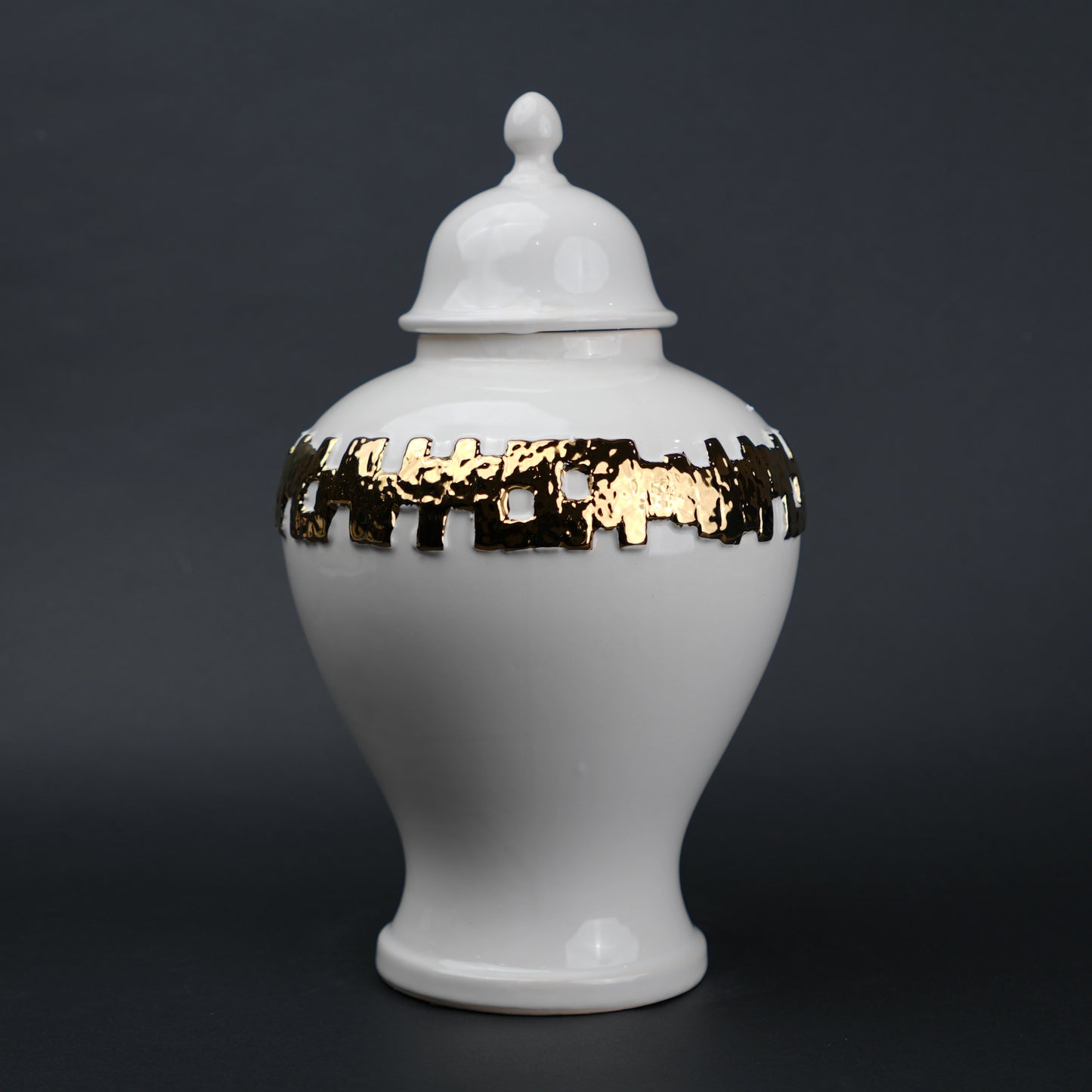 White ceramic jar with gold band detailing and lid for modern home decor styling