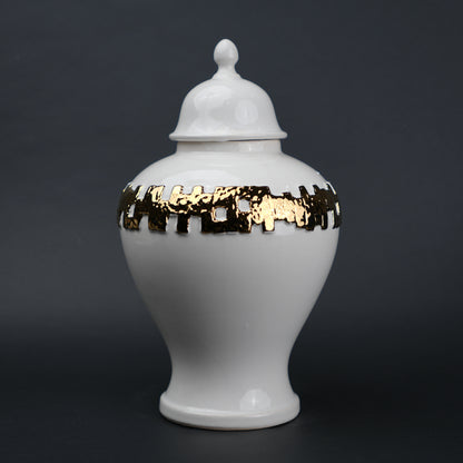 White ceramic jar with gold band detailing and lid for modern home decor styling