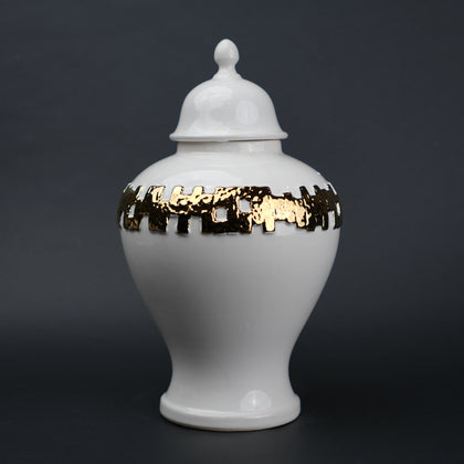 White ceramic jar with gold band detailing and lid for modern home decor styling