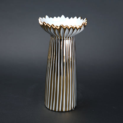 White ceramic candle holder with gold scalloped rim and fluted base for modern home decor styling