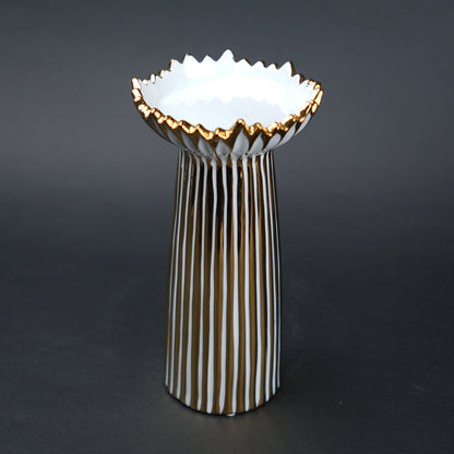 White ceramic candle holder with gold scalloped rim and fluted base for modern home decor styling
