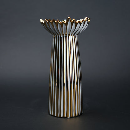 White ceramic candle holder with gold scalloped rim and fluted base for modern home decor styling