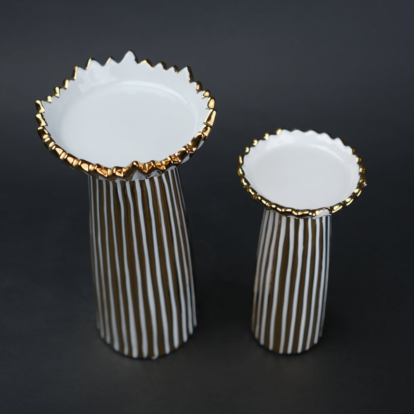 White ceramic candle holder with gold scalloped rim and fluted base for modern home decor styling