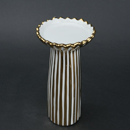 White ceramic candle holder with gold scalloped rim and fluted base for modern home decor styling