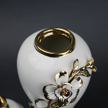 White ceramic jar with gold floral design decorative jar with lid for modern home decor styling