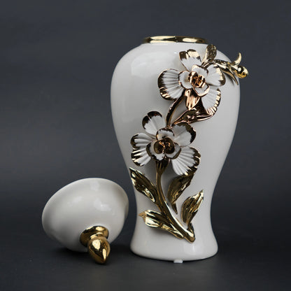 White ceramic jar with gold floral design decorative jar with lid for modern home decor styling