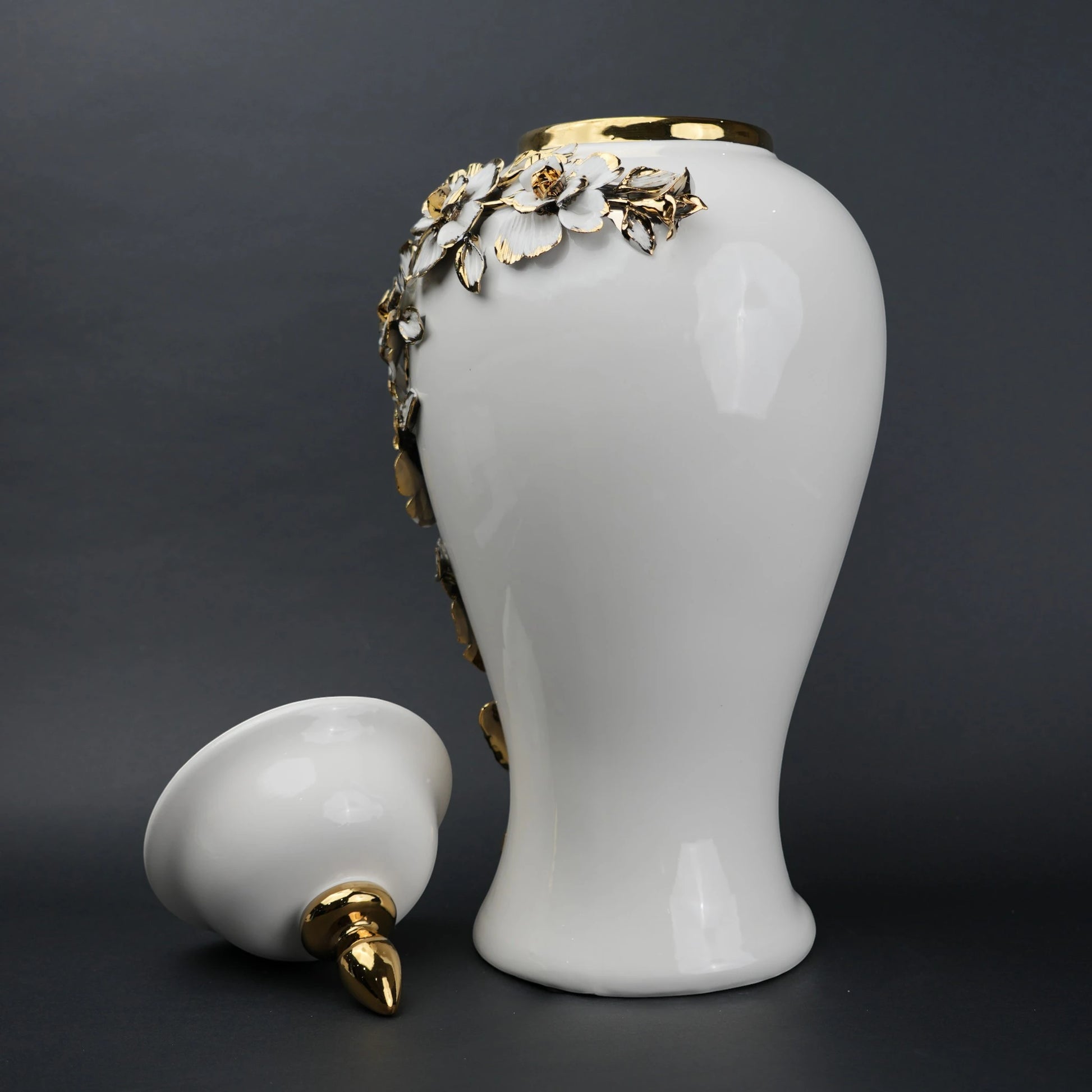 White ceramic jar with gold petal detailing and lid for decor and flower vase styling