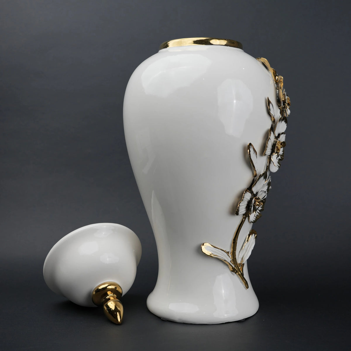White ceramic jar with gold petal detailing and lid for decor and flower vase styling