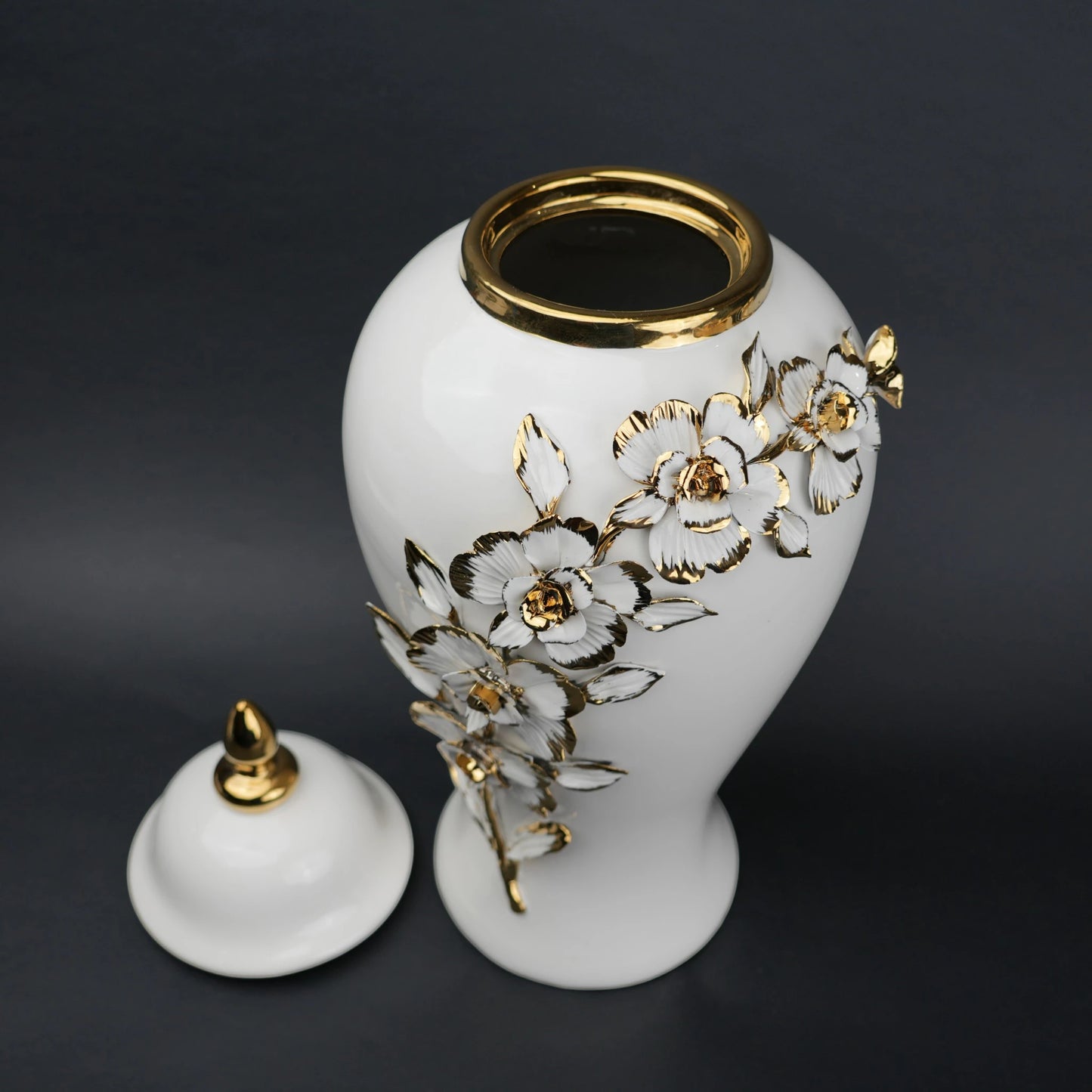 White ceramic jar with gold petal detailing and lid for decor and flower vase styling