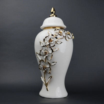 White ceramic jar with gold petal detailing and lid for decor and flower vase styling