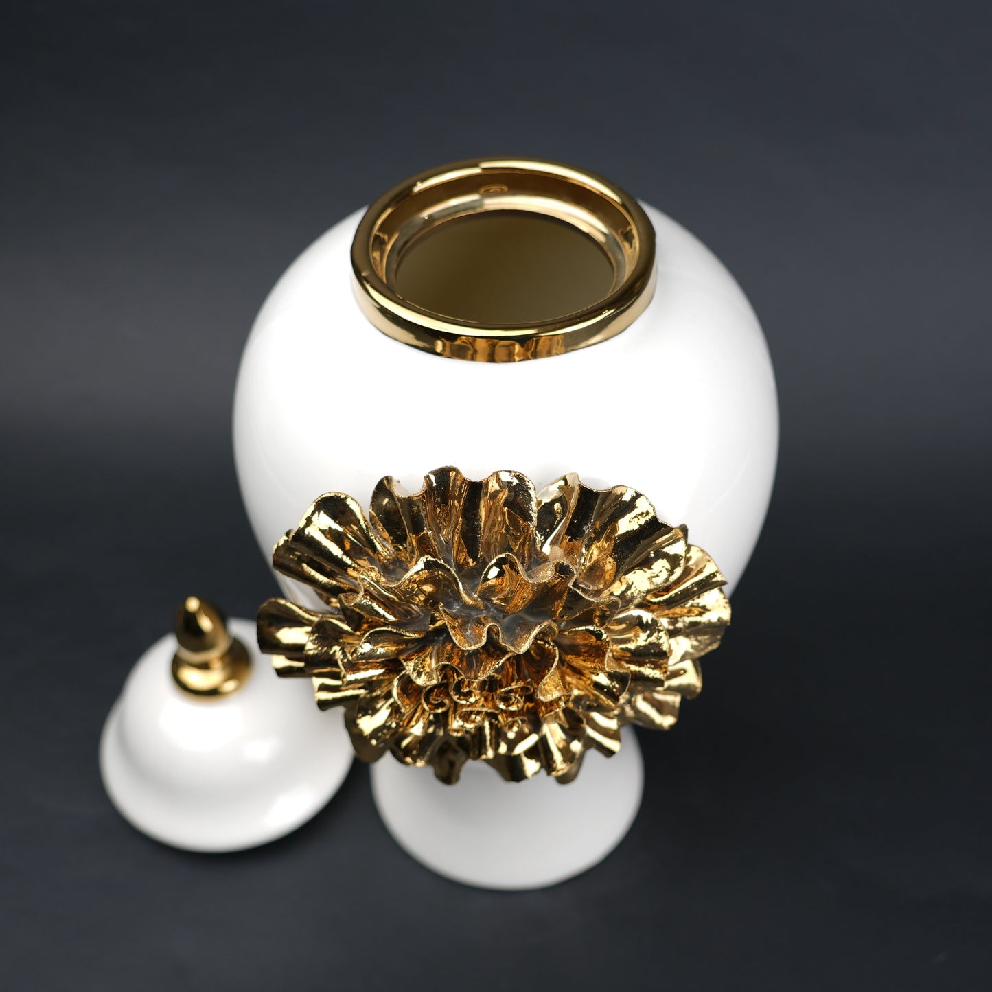 White ceramic decorative jar with gold laurel leaf band and lid