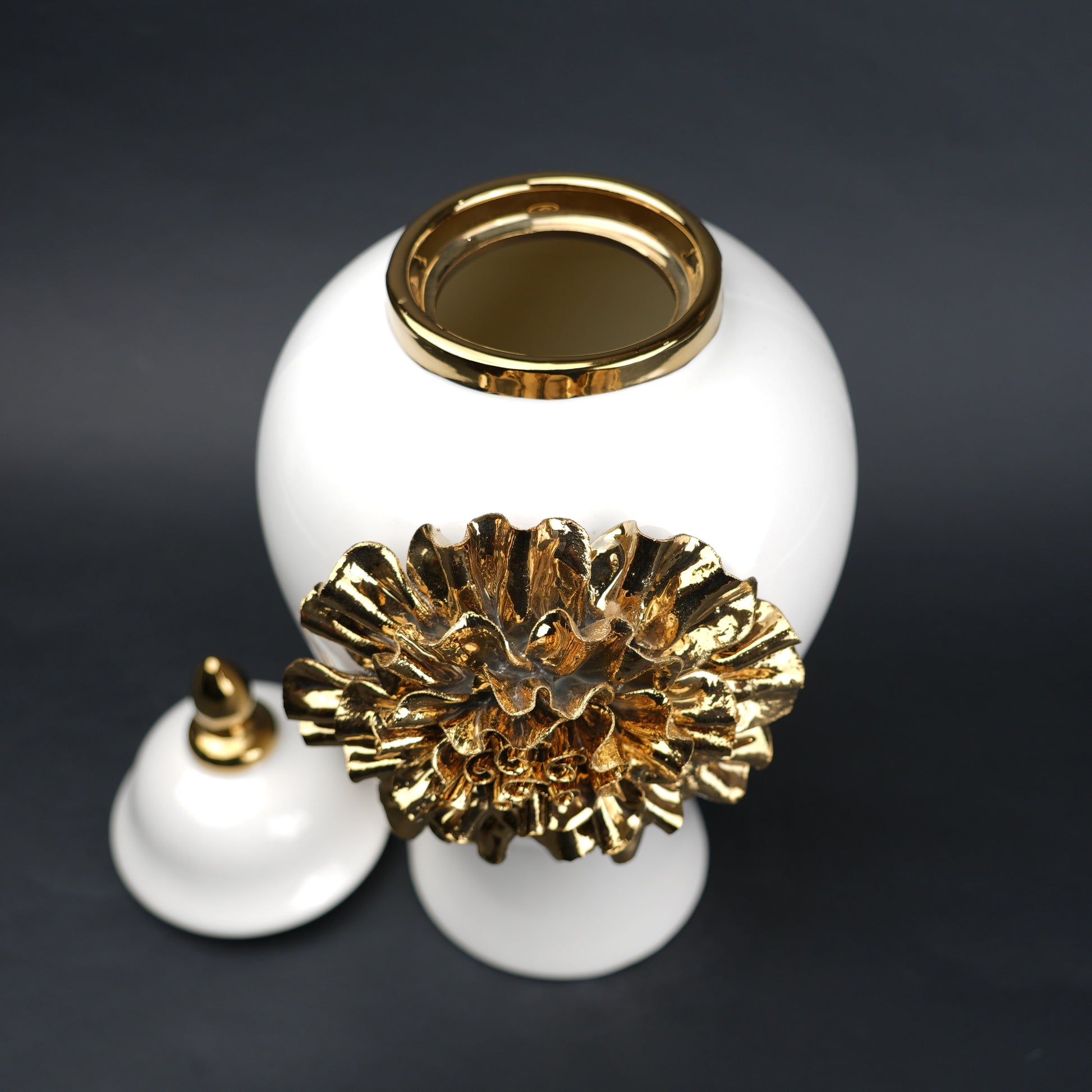 White ceramic decorative jar with gold laurel leaf band and lid
