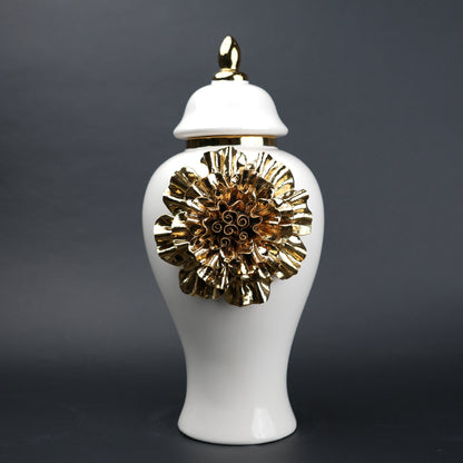 White ceramic decorative jar with gold laurel leaf band and lid