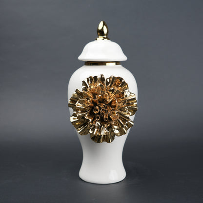 White ceramic decorative jar with gold laurel leaf band and lid