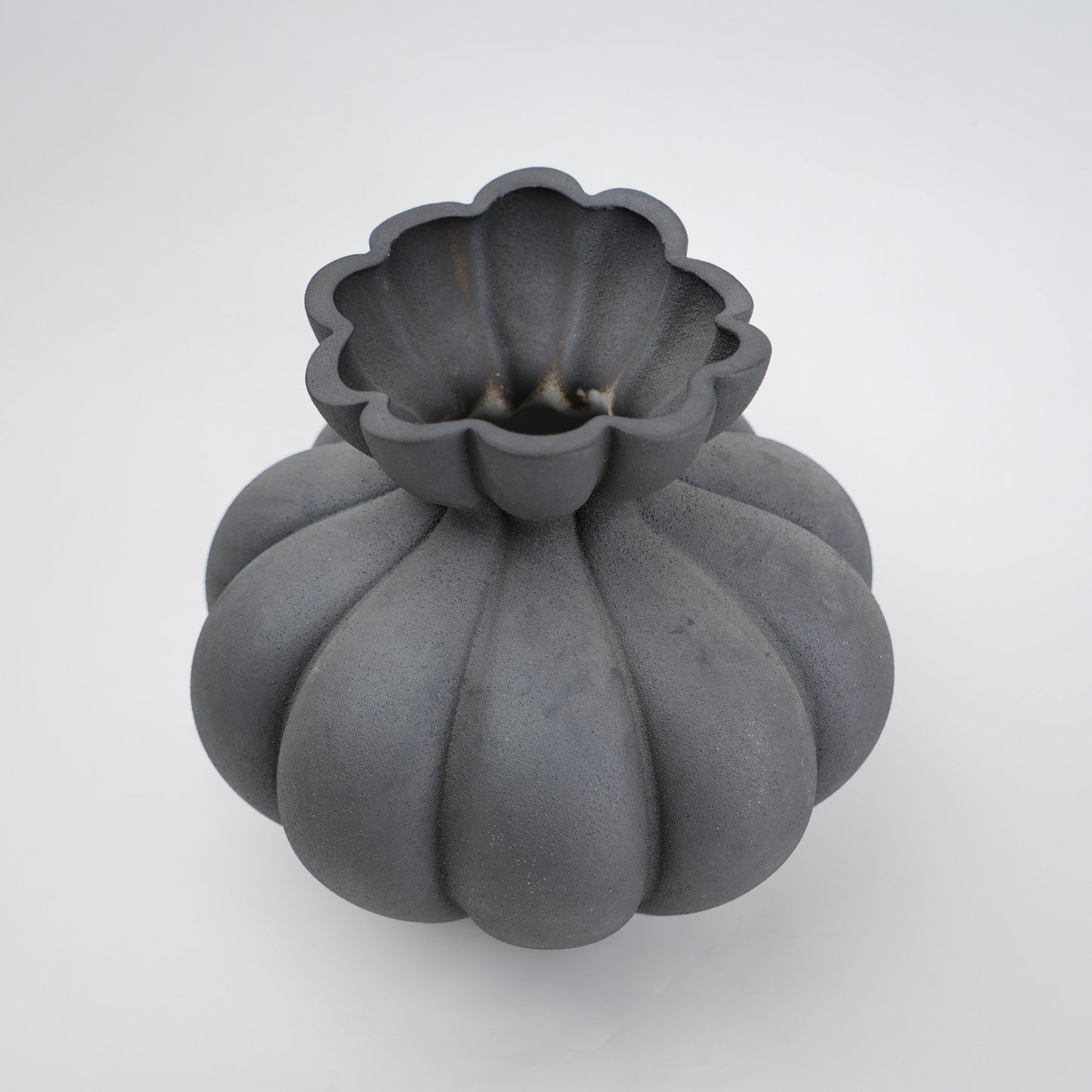 Fluted ceramic vase in matte charcoal for modern home decor styling
