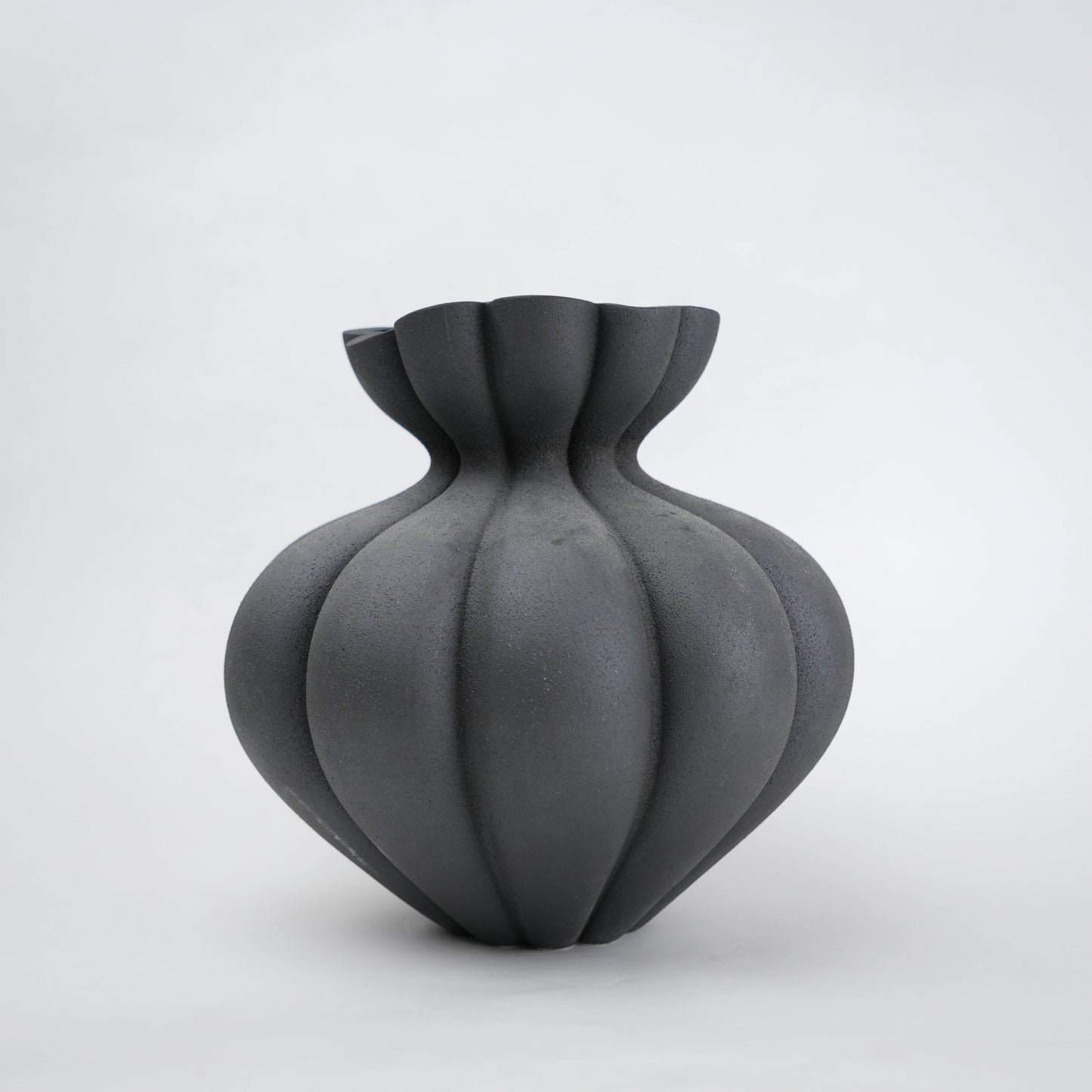 Fluted ceramic vase in matte charcoal for modern home decor styling