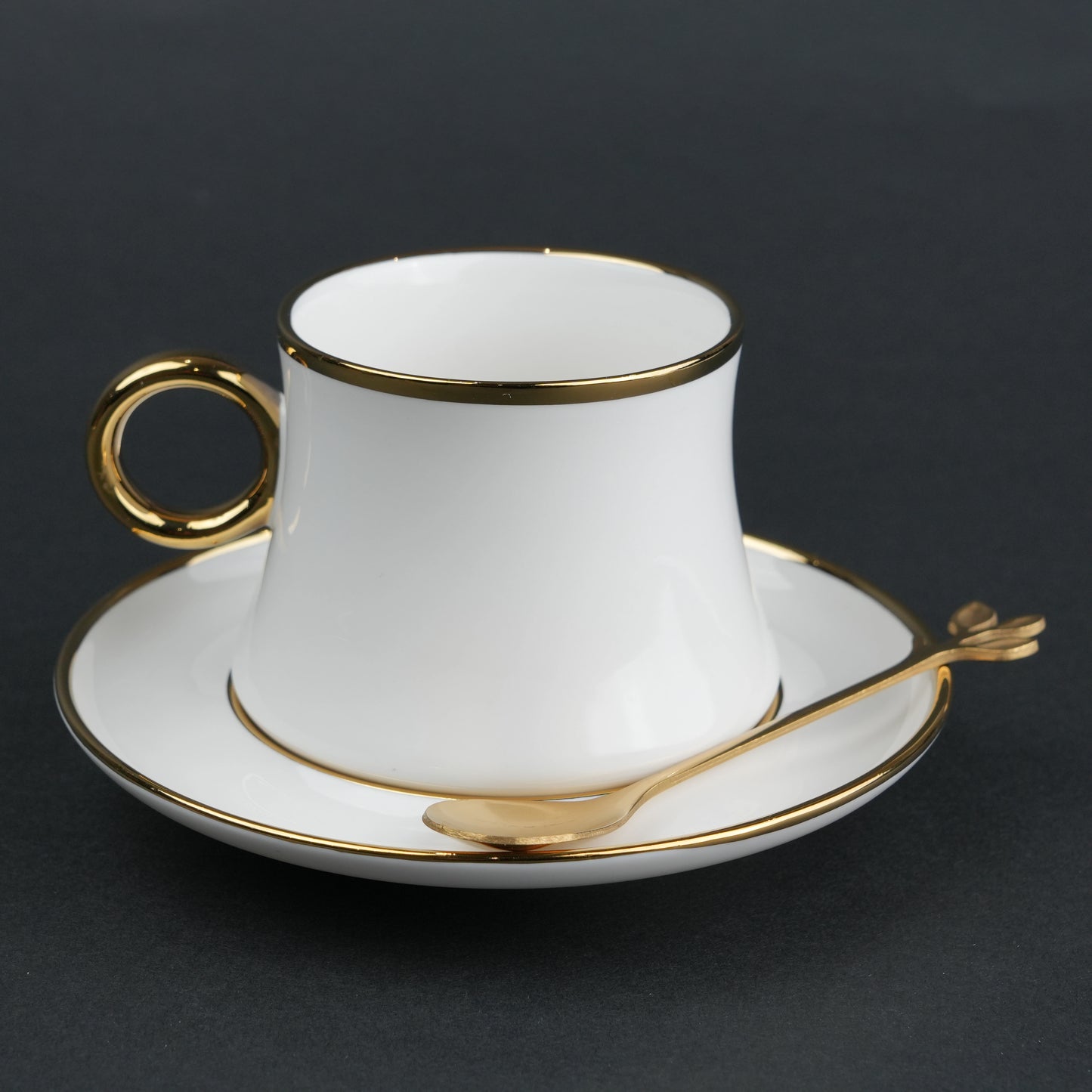 White ceramic cup and saucer set with gold rim and spoon modern tea coffee serving set