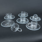 beaded glass tea cup and saucer set available in amber and clear textured glass for modern table setting