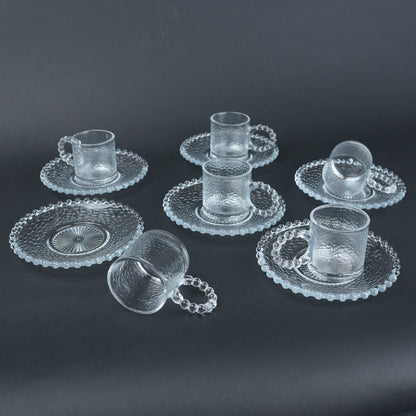 beaded glass tea cup and saucer set available in amber and clear textured glass for modern table setting