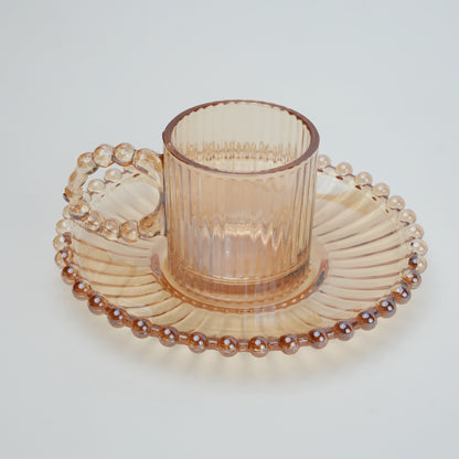 beaded glass tea cup and saucer set available in amber and clear textured glass for modern table setting