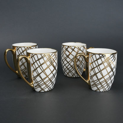Aura Mug Set of 4 white ceramic mugs with gold detailing
