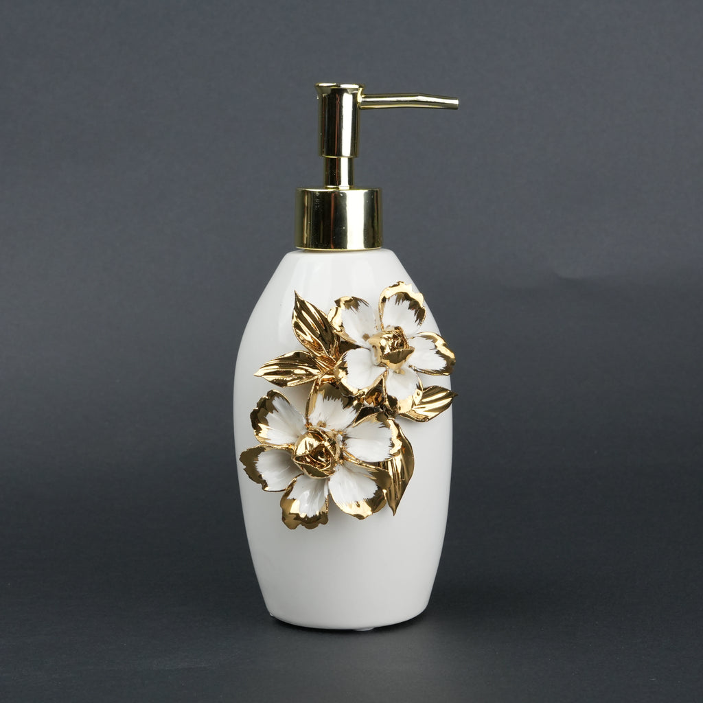Ivory ceramic soap dispenser with gold floral detailing and metallic pump